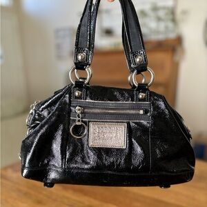 Black leather coach purse with silver hardware